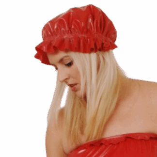 Model wearing red latex adult baby bonnet with matching outfit – handmade latex clothing UK