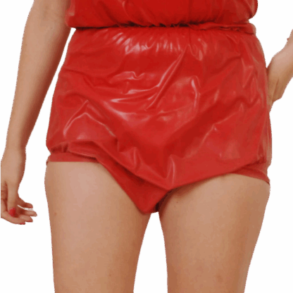 Model wearing red latex adult baby pants – handmade latex ABDL clothing UK