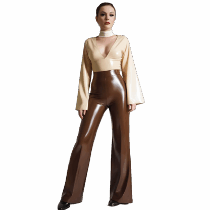 Model wearing handmade latex luxe outfit – high waisted wide leg trousers in brown latex paired with a gold long sleeve latex top. Designed in London by Latexandlovers.