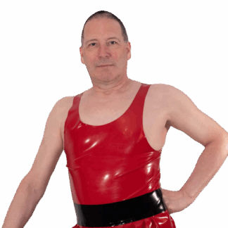Man wearing red handmade latex rubber vest, sleeveless tank style. Designed in London by Latexandlovers – men’s latex clothing UK.