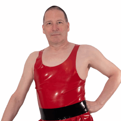 Man wearing red handmade latex rubber vest, sleeveless tank style. Designed in London by Latexandlovers – men’s latex clothing UK.