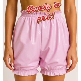 Model wearing shiny pink latex bloomers with frilled edges, handmade in London, size medium